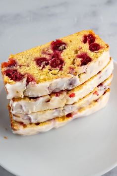 three slices of cake sitting on top of a white plate