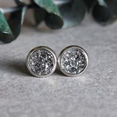 Grey Druzy Earrings, Small Grey Stud Earrings, Grey Earrings, Gunmetal Earrings, Grey Bridesmaid Earring, Sparkly Stud Earring, Gift for Mom These shimmering grey druzy earrings add neutral sparkle to your outfit! * Size: 8mm - small grey stud earrings * The druzy made of resin, they're lightweight and easy to wear!! * The grey earrings include soft plastic backings * Earring settings are hypoallergenic stainless steel, gentle on sensitive skin * For hygiene reasons, no returns on earrings MATCH Bridesmaid Earring, Grey Jewelry, Grey Earrings, Gunmetal Earrings, Large Stud Earrings, Bridesmaid Earrings Gold, Gray Jewelry, Gray Earrings, Mermaid Earrings