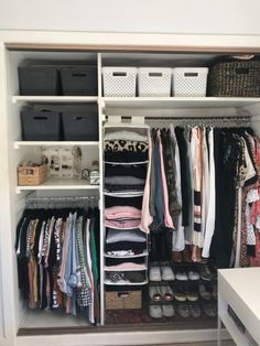 an organized closet with clothes and shoes