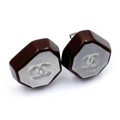 Chanel Burgundy Silver CC Piercing Earrings  *Marked 99 (Missing one hallmark) *Made in France  -Approximately 0.5″ x 0.5″ -Very classic and pretty -In a good condition. It shows normal signs of wear.  AB1989-00094  Please see the measurements section for best approximate dimensions. Designer Silver Clip-on Earrings For Gift, Designer Silver Clip-on Earrings As Gift, Luxury Clip-on Earrings For Gift, Modern Brown Earrings For Formal Occasions, Elegant Brown Plug Earrings As Gift, Elegant Brown Plug Earrings For Gift, Cc Piercing, Piercing Earrings, Accessories Jewelry Earrings