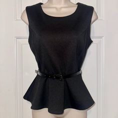 New With Tag - Black Sleeveless Belted Peplum Top. Goes With Everything! Size 4 - Approximately 21.5 Inch From Shoulder To Hem Fitted Black Peplum Top, Black Sleeveless Peplum Top For Spring, Black Fitted Casual Peplum Top, Black Fitted Peplum Top For Spring, Fitted Black Peplum Top For Spring, Chic Black Sleeveless Peplum Top, Chic Sleeveless Peplum Top For Night Out, Fitted Sleeveless Peplum Top For Workwear, Spring Sleeveless Peplum Top For Night Out