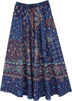 A deep navy blue ethnic bohemian skirt with a wide hemline and ethnic shuffle prints of flowers, elephants, peacocks, paisley etc.  on the cotton fabric gives a unique look to this style. #tlb #MaxiSkirt #Dance #Floral #Printed #Elephant #Paisley #bohemianfashion #Indian #GarbaSkirt #IndianSkirt #GujaratiDanceSkirt Blue Boho Print Long Skirt, Bohemian Cotton Skirt With Batik Print, Blue Cotton Printed Skirt, Blue Printed Cotton Skirt, Bohemian Cotton Printed Skirt, Blue Floral Print Skirt For Festivals, Blue Boho Print Maxi Skirt For Festival, Traditional Blue Cotton Skirt, Blue Cotton Hippie Skirt