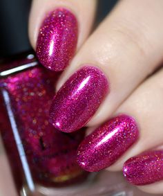 Nexus is a rich holographic nail polish with a delicious raspberry hue. Once on your nail, you'll notice a gorgeous array of red sparkle that shifts from pink to gold. Look closer and you'll see we've added the perfect amount of gold sparkle to enhance the beauty of this gem. Last but not least, Nexus showcases a variety of holographic particles to bring everything together and add a beautiful rainbow sparkle in the right lighting conditions! Fully opaque in 2 to 3 coats. Beautiful Nail Polish, Rainbow Sparkle, Red Sparkle, Holographic Nails, Beautiful Nail Art, Christmas Nail Art, Nail Paint