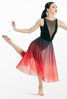 a woman in a black and red dress is dancing