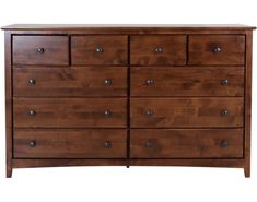 a wooden dresser with many drawers and knobs on the bottom drawer, against a white background