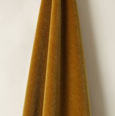 a close up view of an orange curtain