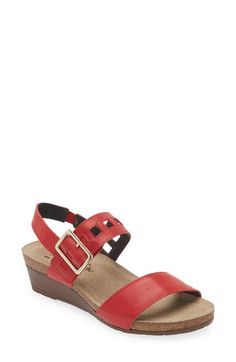 A supple leather upper with metallic accents and a polished buckle offers eye-catching appeal to this open-toe sandal with a low wedge for added comfort. 1 3/4" heel (size 39) Cushioned cork-and-latex footbed with arch support Leather upper and lining/synthetic sole Imported Red Open Toe Wedge Sandals With Buckle, Red Open Toe Wedge Sandals With Buckle Closure, Red Leather Slingback Sandals With Buckle Closure, Low Wedges, Open Toe Sandals, Wedge Sandal, Sandal Women, Metallic Accents, Arch Support