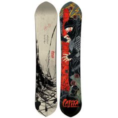 a snowboard with an image of a skeleton on the bottom and another one behind it