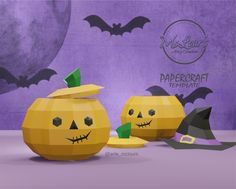 three pumpkins with faces carved into them, sitting in front of a purple background