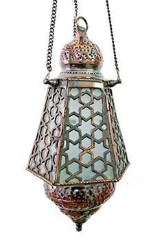 an ornate lantern hanging from a chain