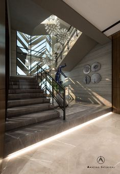 the stairs in this modern house are made of concrete and steel with glass balconies