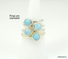 Introducing our newest gemstone ring: a stackable sterling silver minimalist larimar ring. These rings have a plain round 1.5mm band that is super comfortable and pairs perfectly with any outfit! A 6mm natural larimar cabochon is nestled in this beautiful 925 sterling silver setting. Each stone varies slightly, as shown in pictures. Add one (or several!) of these lovely rings to your collection before they are gone! Metaphysical Properties (not backed by scientific evidence): Larimar is also kno Adjustable Larimar Rings As Gift, Larimar Ring, Larimar Rings, Minimalist Ring, Fall Jewelry, Lovely Ring, Stackable Ring, Minimalist Rings, Keep Jewelry