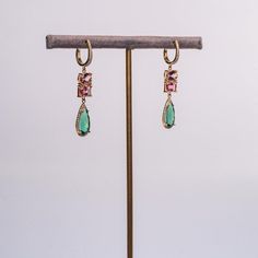 This is part of Chairish’s Fine Jewelry assortment.  The combination of the pale pinks and beautiful green tourmaline make these the chicest...The scale is appropriate for every day chic, date night or even black tie. They simply screen glamour.  14K Gold; .34 CT Diamonds; 8.6 CT Tourmaline; Hangs 1.25 Inches off the ear Elegant Tourmaline Earrings With Gemstone Accents, Elegant Tourmaline Earrings For Formal Occasions, Elegant Tourmaline Drop Earrings, Elegant Tourmaline Teardrop Earrings, Elegant Tourmaline Dangle Earrings, Elegant Green Tourmaline Earrings, Accessories Jewelry Earrings, Green Tourmaline, Black Tie