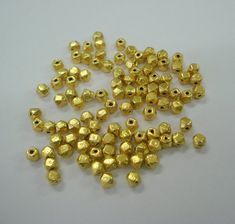 20kt gold beads (100 pieces) from rajasthan india. great design made of 20kt yellow gold, good for jewelry creation.Note - If you want more or less beads. It is possible.weight approx - 10 gramssize - 4 mmmaterial - 20kt yellow gold. Gold Oval Polished Beads, Gold Spacer Beads For Festivals, Gold Polished Beads For Temple Jewelry, Gold Beads For Temple Jewelry Making, Traditional Gold Beads For Jewelry Making, Gold Faceted Beads For Temple Jewelry, Gold Temple Jewelry Beads As Gift, Traditional Gold Faceted Beads, Gold Temple Jewelry Beads For Festive Occasions