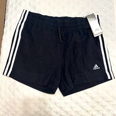 Women’s Black And White Adidas Shorts New With Tags. Medium. Fast Shipping. Adidas Cotton Shorts With Three Stripes, Adidas Cotton Bottoms With Built-in Shorts, Cotton Shorts With Three Stripes, Adidas Athletic Cotton Shorts With Built-in Shorts, Adidas Casual Shorts, Casual Adidas Shorts, Casual Short Bottoms With Three Stripes, Adidas Stretch Casual Shorts, Casual Adidas Shorts With Stretch