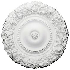 a white plate with an intricate design on it