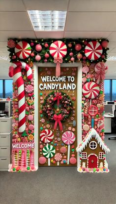 an office decorated for christmas with candy land decorations