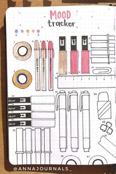 an open notebook with various items on it