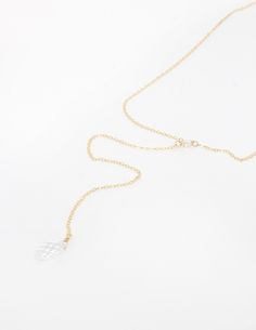 If you're looking for a delicate necklace to complement your open back bridal gown, then this is just perfect for your big day! It is entirely made of a light weight chain (Sterling Silver, Gold Filled or Rose Gold Filled), which is the go to even if you have sensitive skin. The front of the necklace has a tiny Swarovski crystal just to add a bit of spark. The back drops down and ends with a multi faceted Swarovski teardrop. This necklace is simple, but yet so elegant and it's so comfy you won't Delicate Single Strand Bridal Necklace, Delicate Adjustable Bridal Necklace, Delicate Bridal Necklace With Adjustable Chain, Delicate Single Strand Bridal Necklace For Wedding, Delicate White Crystal Necklace With Delicate Chain, Delicate White Single Strand Bridal Necklace, Elegant Wedding Crystal Necklace With Delicate Chain, Minimalist Crystal Necklace With Delicate Chain For Weddings, Delicate White Backdrop Necklace As A Gift