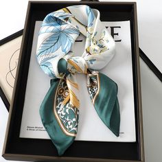 Indulge in Luxurious Fashion Elevate your ensemble with our exquisite Chic Silk Square Scarf, a timeless accessory that effortlessly combines sophistication and versatility. Crafted from premium silk, this scarf embodies luxury, making it a must-have addition to your wardrobe. Whether you're strolling along the beach, attending a garden party, or simply adding a touch of elegance to your everyday look, our silk scarf promises to elevate your style quotient with its understated charm. Unveiling t Elegant Green Scarves For Summer, Elegant Green Summer Scarves, Elegant Green Floral Print Silk Scarf, Elegant Green Floral Silk Scarf, Elegant Green Satin Silk Scarf, Elegant Floral Print Scarves As A Gift, Elegant Floral Print Scarves As Gift, Elegant Floral Print Scarf For Gift, Satin Hair Scarf