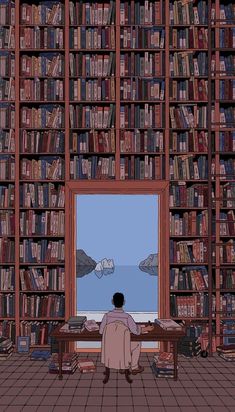 a man sitting at a table in front of a book shelf filled with books and looking out the window