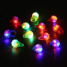 several different colored lights sitting on top of a table