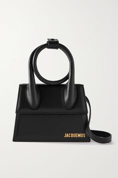 Jacquemus' cult 'Le Chiquito' bags are  never  in stock for long, so you won't want to leave this one lingering in your wish list. Made from smooth leather, it has a structured shape, artfully twisted handle and a longer shoulder strap. Match any jewelry to the gold designer lettering. Bag Jacquemus, Jacquemus Le Chiquito, Jacquemus Bag, Statement Bag, Celine Luggage Bag, Designer Crossbody Bags, Orange Bag, Givency Antigona Bag, Black Bag