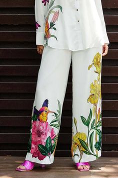 White shirt featuring blossom placement print. Paired with a co-ordinating pant. - Aza Fashions White Floral Print Pants, White Floral Print Straight Pants, Spring Printed White Pants, Spring Printed Sets With Wide Leg, Spring Printed Wide-leg Sets, Spring Printed Wide Leg Sets, White Floral Print Trousers, Elegant White Printed Bottoms, Spring Wide Leg Printed Sets