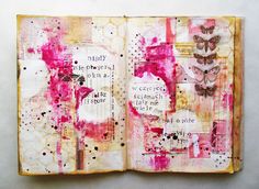 an altered book with pink and white designs