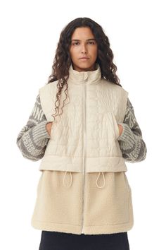 This Ripstop Quilt Fleece Vest is made from recycled polyester. The vest is designed for a relaxed fit and features a high neck, zip closure, side pockets and a drawstring a the lower waist. Quilt Vest, Jeans Boots, Cropped Vest, Outerwear Vest, Tshirt Skirt, Quilted Vest, Fleece Vest, Sleeveless Vest, Grey Women