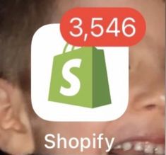 a young boy holding a shopping bag with the number 3, 546 shopify on it