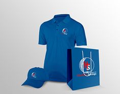 a blue polo shirt and hat with the logo on it, sitting next to a shopping bag