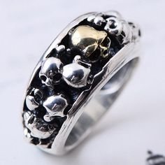 Men's Sterling Silver Skulls RingMetal Type: 925 Sterling Silver / Brass (the yellow part)Gender: For MenStyle: PunkWidth: 11 mmThickness: 5 mmWeight: 12.5 gSize: 7.5-11.5Minimum Order: 1 Sterling Silver Skull Rings, Silver Skull Ring, Style Punk, Sterling Silver Mens, Skull Ring, Silver Brass, Rings For Men, Silver Rings, 925 Sterling Silver