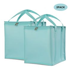 two bags with handles and straps on each side, one is light blue in color