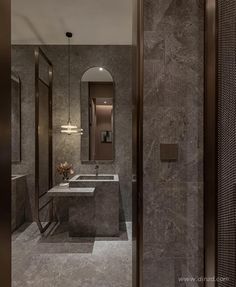 a bathroom with two sinks and a mirror in the wall next to it is shown