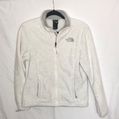 White Northface Women’s Osito Jacket, Size Small. This Has Been Well Loved And Is Not As Fluffy And Soft As When They Are Brand New. Two Front Pockets, Nf Logo On The Front Left Chest And Back Right Shoulder. Sleeves Have More Of A Cream Color Around The Wrist. They Also Have Little Buttons, No Idea What That’s For Lol. There Are Two Very Small Orange Colored Spots On The Left Sleeve (See Photo), Unsure What It’s From, Probably Could Be Cleaned With A Small Amount Of Bleach. White Fleece Jacket For Outdoor, Nf Logo, Black Hooded Jacket, North Face Sweatshirt, Retro Sportswear, North Face Fleece Jacket, Vintage Sportswear, North Face Fleece, Womens Fleece