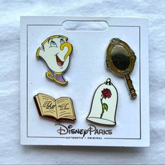 disney parks pin set featuring beauty and the beast