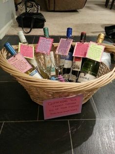 a wicker basket filled with lots of wine bottles and notes on the side of it