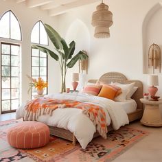 a large bed sitting in a bedroom on top of a rug next to a window