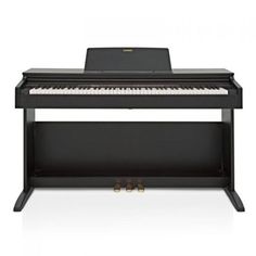 a black piano sitting on top of a white floor