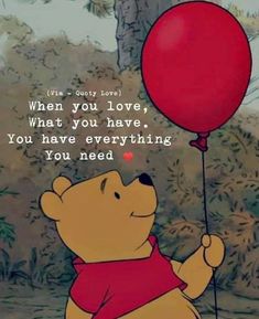 winnie the pooh holding a red balloon with quote about love and being loved by someone