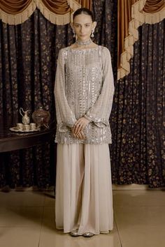 Ivory A-line short kurta embellished with silver gota applique, aari and zardozi hand embroidery. Paired with a palazzo. - Aza Fashions Kurta With Palazzo, Short Kurta, Straight Kurta, A Line Shorts, Aza Fashion, Full Sleeve, Boat Neck, Hand Embroidery, Chiffon