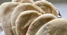 several pita breads stacked on top of each other