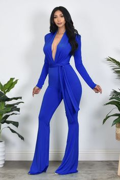 DETAILS: Model is wearing small Model measurements, height and weight located in size chart Model wearing 4" heels Order ships within 24-48 hours or sooner (Monday-Friday) 95% Polyester 5% Spandex Has stretch Adjustable tie Shoulder pads 37" inseam See Sizes in Size Chart Jumpsuit V Neck, Stretch Jumpsuit, Jumpsuit Blue, Latest Video, Height And Weight, Tie Belt, Shoulder Pads, Fashion Boutique, Royal Blue