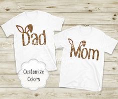 two shirts with the words, dad and mom in gold glitter letters on white t - shirts