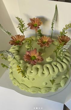 there is a cake with flowers on it