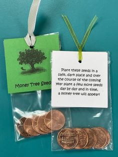 some coins and a note with a tree on the back that says money tree seed