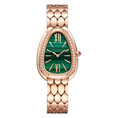 Bulgari Serpenti Seduttori quartz watch with a 33mm 18kt rose gold case and 18kt rose gold diamond bezel and malachite dial on an 18kt rose gold bracelet. Brand: BulgariModel: Serpenti SeduttoriReference Number: 103273Movement: QuartzCase Material: Rose GoldCase Size: 33mmDial: MalachiteBracelet/Strap: Rose GoldGender: Women's WatchWarranty: Manufacturer's WarrantySKU: 31116 Shop other beautiful pieces in our Bulgari collection For inquiries on the piece please contact: boutique@shsilver.com Serpenti Seduttori Watch, Bulgari Watch, Bulgari Serpenti, Flexible Bracelet, Bvlgari Serpenti, Rose Gold Watches Women, Rose Gold Case, Rose Gold Bracelet, Rose Gold Watch