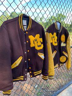 "These 1980's Letterman jackets are so cool! One of these is a baseball state champ jacket and the other has a few less patches. Here are the measurements and descriptions for both: Cloth Sleeve Letterman Jacket: Shoulders: 19 inches Chest: 44 inches Waist: 42 inches Shoulders to Hem: 25 inches This jacket is the one on the left in pictures. It has cloth sleeves and a few less patches than the State Champion jacket. It has a plain back with no writing on the back. This jacket is closest to a lar 70s Letterman Jacket, Vintage Letterman Jacket Outfit, Long Sleeve Outerwear For Baseball Game Day, Retro Outerwear With Baseball Collar And Ribbed Cuffs, Collegiate Varsity Jacket With Letter Patch For Fall, Retro Cotton Varsity Jacket With Letter Print, Varsity Jacket With Embroidered Patch For Winter, Winter Varsity Jacket With Embroidered Patch, Retro Varsity Jacket With Letter Print For College