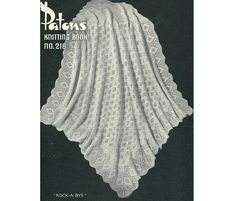 an old crochet pattern for a shawl on the cover of a book